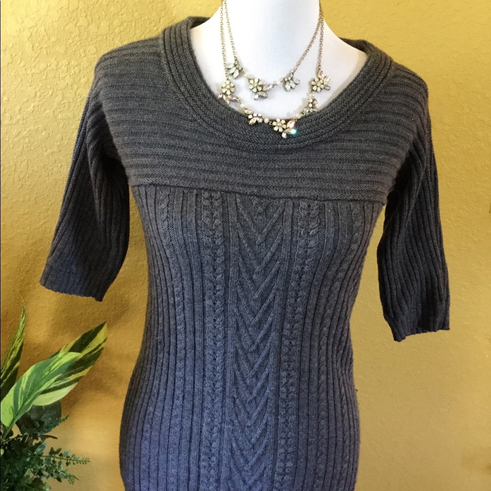 The limited dark gray sweater medium
